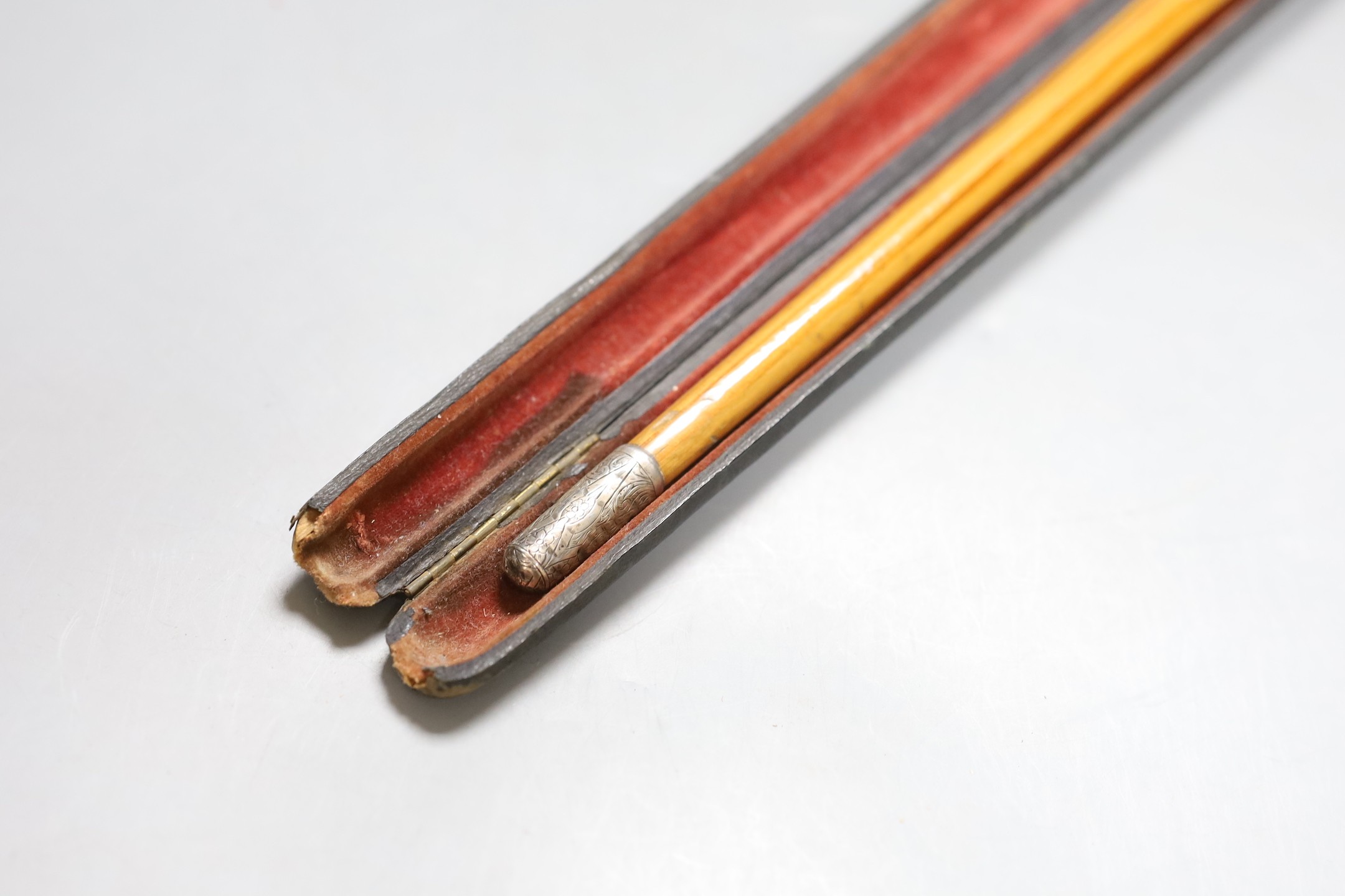 A cased presentation conductors baton, baton 51.5 cms long.